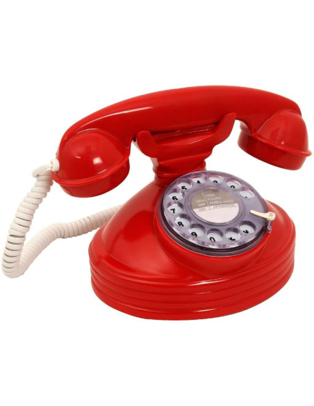 Teléfono retro rojo de sobremesa con dial giratorio y auricular clásico.