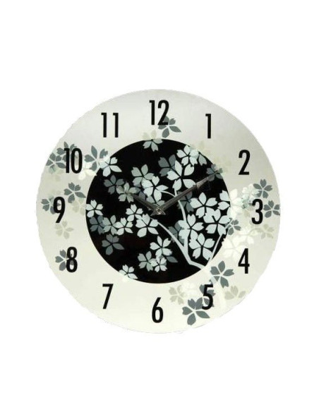 Reloj de pared redondo de cristal con diseño floral en blanco y negro.