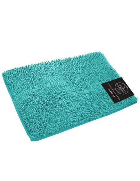 Alfombra de baño turquesa de textura suave con base antideslizante.