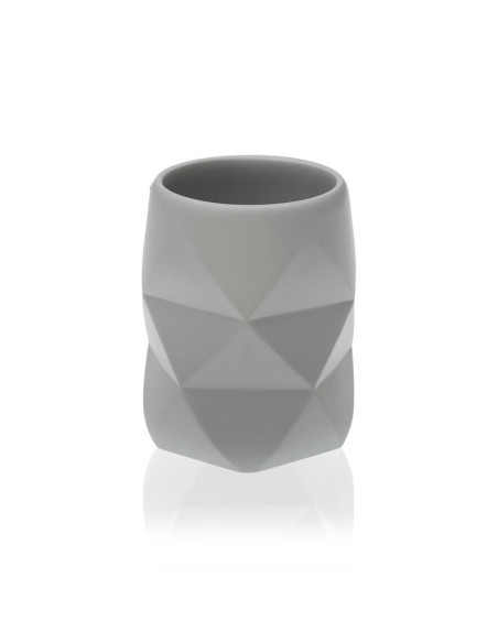 Vaso portacepillos gris de resina con diseño geométrico en relieve.