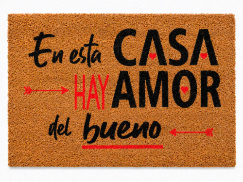 Felpudo original de fibra de coco con la frase En esta casa hay amor del bueno