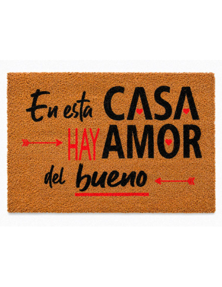 Felpudo original de fibra de coco con la frase En esta casa hay amor del bueno